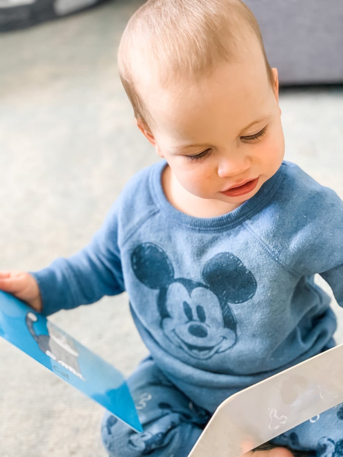 Baby playing with flashcards