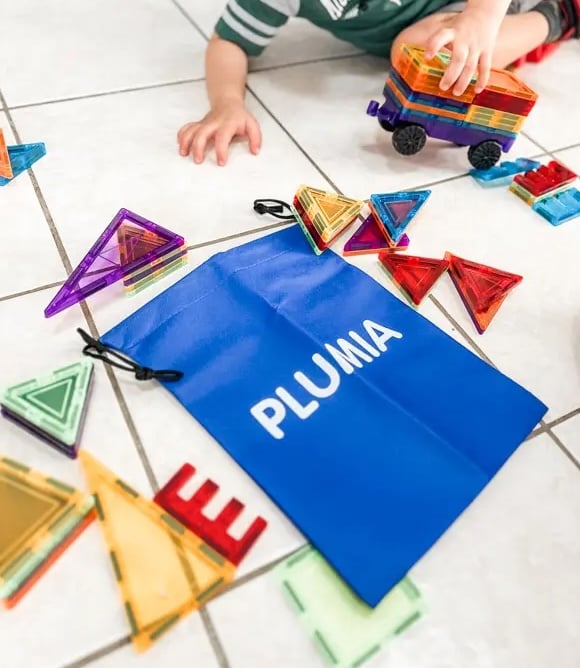 child-playing-with-Plumia-toys