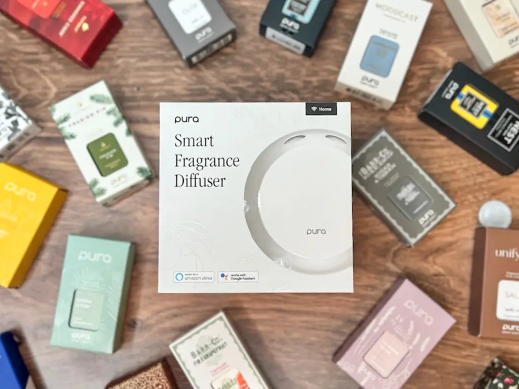 pura smart fragrance device with lots of fragrance vials